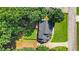 A gorgeous backyard with a private fence, verdant lawn, and charming deck perfect for outdoor relaxation at 1048 Falls Brooke Dr, Conyers, GA 30094