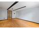 Unfinished basement with wood-look flooring and potential for customization at 1048 Falls Brooke Dr, Conyers, GA 30094