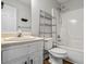 Full bathroom with a shower-tub combo, vanity sink, and chrome fixtures at 1048 Falls Brooke Dr, Conyers, GA 30094