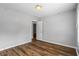 Basic bedroom with light walls, laminate floors, and neutral design at 1048 Falls Brooke Dr, Conyers, GA 30094