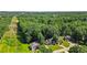 A delightful neighborhood with beautifully landscaped homes, mature trees, and green lawns at 1048 Falls Brooke Dr, Conyers, GA 30094