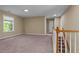 Bonus room with neutral walls, carpet, and a large window at 1137 Misty Valley Ct, Lawrenceville, GA 30045
