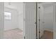 Walk-in closet with built-in shelving for storage at 1137 Misty Valley Ct, Lawrenceville, GA 30045