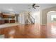 Open-concept living area with hardwood floors, staircase, and easy access to the kitchen area at 1137 Misty Valley Ct, Lawrenceville, GA 30045