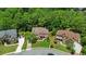 Stunning aerial view of suburban homes with lush green lawns and mature trees, offering a picturesque neighborhood setting at 2230 Cambridge Hill Ct, Dacula, GA 30019