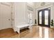 Bright foyer with hardwood floors, and gorgeous front door at 2230 Cambridge Hill Ct, Dacula, GA 30019