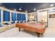 Recreation room features a billiards table and comfortable theater seating, perfect for entertainment at 2230 Cambridge Hill Ct, Dacula, GA 30019