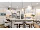 Well-equipped kitchen with breakfast bar and stainless-steel appliances at 2230 Cambridge Hill Ct, Dacula, GA 30019