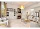 Elegant living room showcasing fireplace, built-in shelves, and ample seating at 2230 Cambridge Hill Ct, Dacula, GA 30019