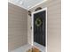 Charming front door with black paint, white trim, and a decorative wreath at 603 Brighton Pt, Atlanta, GA 30328
