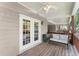 Outdoor patio with a seating area and wooden floors and view at 603 Brighton Pt, Atlanta, GA 30328
