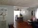 Inviting dining area with hardwood floors, ample natural light, and a ceiling fan at 649 Mary Ln, Marietta, GA 30062