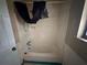 Bathroom with a shower-tub combination, a basic yet functional space, ready for modernization or updates at 718 Hardy Way, Hiram, GA 30141