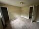 Bedroom with closet, featuring carpeting and neutral walls, ready for personal touches and decor at 718 Hardy Way, Hiram, GA 30141