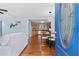 A view into a light blue living room featuring hardwood floors and contemporary decor at 1694 Pheasant Dr, Atlanta, GA 30238