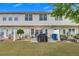 Backyard area with patio, seating, grill, and partial fence at 2083 Hasel St, Lawrenceville, GA 30044