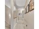 Upstairs hallway with carpet, arches and artwork at 2083 Hasel St, Lawrenceville, GA 30044