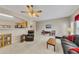 This is a spacious and open living room that offers natural light, carpet, and access to the kitchen at 2083 Hasel St, Lawrenceville, GA 30044