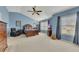 Spacious main bedroom features vaulted ceiling, natural light, and neutral carpet at 2083 Hasel St, Lawrenceville, GA 30044