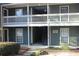 Exterior view of building 7 with white railings, stairs, and the building number at 2697 Vinings Central Dr # 61, Atlanta, GA 30339