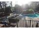 Pool and landscaping area featuring lounge chairs and covered structures at 2697 Vinings Central Dr # 61, Atlanta, GA 30339