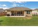 Spacious backyard with a covered patio, great for entertaining and relaxing at 2980 Prestwood Dr, Cumming, GA 30040