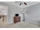 Spare bedroom offering a TV and a small dresser with overhead fan at 2980 Prestwood Dr, Cumming, GA 30040