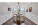 Formal dining room with hardwood floors and sophisticated trim at 2980 Prestwood Dr, Cumming, GA 30040