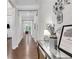 Inviting hallway featuring hardwood floors and decorative accents at 2980 Prestwood Dr, Cumming, GA 30040