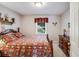 Bedroom with carpet, window and rustic accents at 3359 Villa Ln, Douglasville, GA 30135