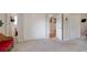 Bedroom featuring plush carpet, closet space and hallway view at 3359 Villa Ln, Douglasville, GA 30135