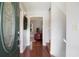 Welcoming entryway with hardwood floors, a decorative door, and access to the upper level at 3359 Villa Ln, Douglasville, GA 30135