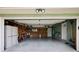 Spacious garage with ample storage space, tools, and painted green trim at 3359 Villa Ln, Douglasville, GA 30135