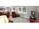 Comfortable living room with ample natural light, plush seating, and a classic area rug at 3359 Villa Ln, Douglasville, GA 30135