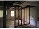 Basement with exposed walls and ceiling; awaiting renovation with visible utility connections and potential for customization at 372 Nalley Dr, Stone Mountain, GA 30087