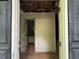 Entryway showcases an opportunity for renovation, leading to the bath and other rooms at 372 Nalley Dr, Stone Mountain, GA 30087