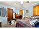 A view of an inviting bedroom featuring natural light, a ceiling fan, and room for personalization at 6250 Graceland Cir, Morrow, GA 30260