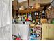 Functional laundry area with washer, shelving, and storage solutions for convenience and organization at 6250 Graceland Cir, Morrow, GA 30260