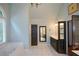 Bathroom with a tub, double vanity and mirrors creating an open space for relaxation at 1464 Chatsworth Trace, Lawrenceville, GA 30044
