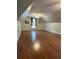 Large bonus room offers hardwood floors, a window, and ample space at 1464 Chatsworth Trace, Lawrenceville, GA 30044