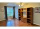 Bedroom featuring a built-in media center and a window with blinds at 1464 Chatsworth Trace, Lawrenceville, GA 30044