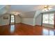 Spacious bonus room with hardwood floors and multiple windows at 1464 Chatsworth Trace, Lawrenceville, GA 30044