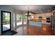 View from dining to kitchen and out to the deck at 1464 Chatsworth Trace, Lawrenceville, GA 30044