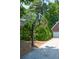 Basketball hoop is located near the three-car garage and driveway at 1464 Chatsworth Trace, Lawrenceville, GA 30044