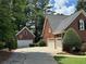 Attached and detached garages for plenty of parking space at 1464 Chatsworth Trace, Lawrenceville, GA 30044