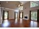 Bright living room with vaulted ceiling, many windows, and fireplace at 1464 Chatsworth Trace, Lawrenceville, GA 30044