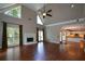 Spacious living room with a fireplace, high ceilings, and access to the kitchen at 1464 Chatsworth Trace, Lawrenceville, GA 30044