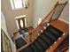 View from the top of the oak and wrought iron staircase overlooking the front entry at 1464 Chatsworth Trace, Lawrenceville, GA 30044