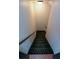 View of staircase with carpeted steps and a handrail at 1464 Chatsworth Trace, Lawrenceville, GA 30044