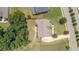 Aerial view of the property featuring a large backyard and mature trees at 162 Aylesbury Blvd, Mcdonough, GA 30252